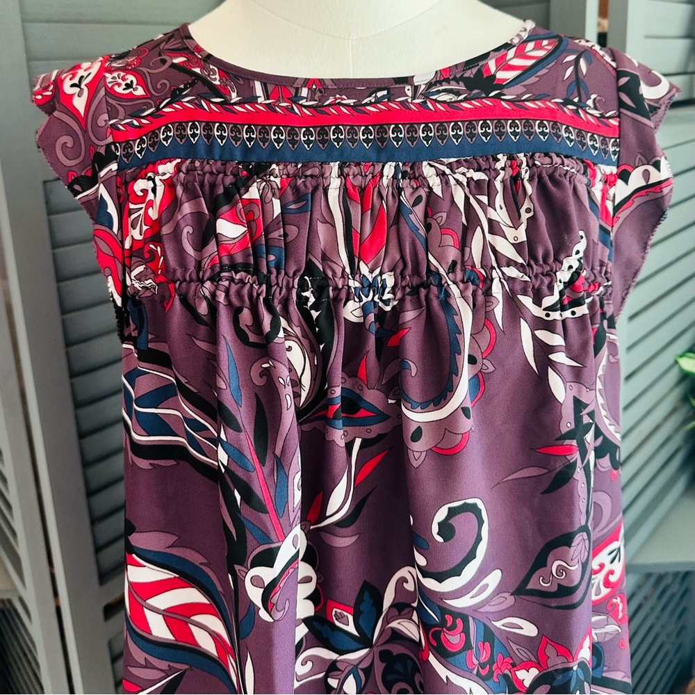 LOFT Purple Paisley Flutter Sleeve Blouse Smocked Ruffle Front and Keyhole Back. - Picture 4 of 11